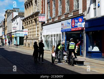 Two Police Community Support Officers in Whitefriargate, Hull, Humberside, East Yorkshire, England UK Stock Photo