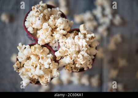 Top view of cones of popcorn, retro style processing. Stock Photo