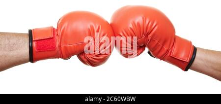 Two hands in red boxing gloves clash Stock Photo