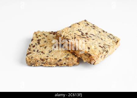 Healthy crackers isolated on white background. Crunchy Biscuits made of seeds Stock Photo