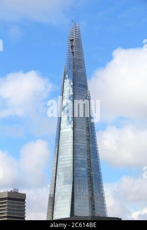 LONDON, UK - APRIL 22, 2016: Shard skyscraper in London, UK. The 309m tall building is the tallest in the United Kingdom. Stock Photo