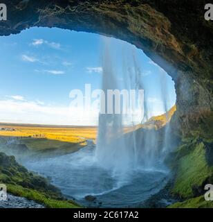 Seljalandfoss waterfall in sunny autumn day, Iceland. Famous tourist attraction Stock Photo