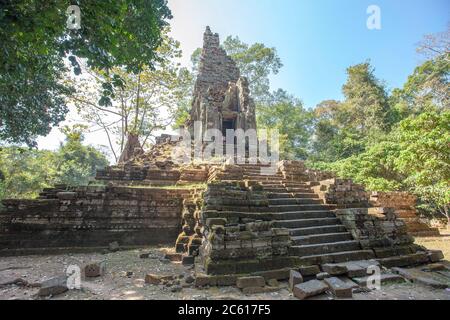 Ancient Preah Palilay temple in Angkor Thom and huge Banyan trees, Angkor, Cambodia. Stock Photo