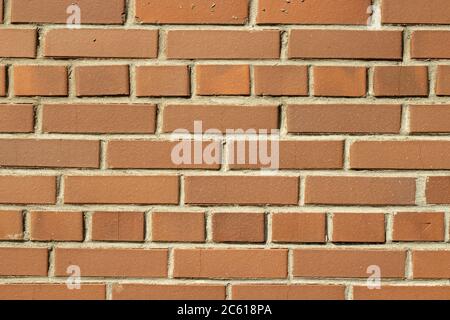 Orange wall brick background. Textured bricks. Copy space Stock Photo