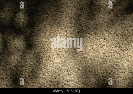 Asphalt surface in the shade. Textured background Stock Photo