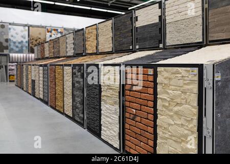 MINSK, BELARUS - April 01, 2020: brick imitation plaster walls, samples in the store Stock Photo