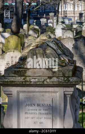 UK, London, City of London, Bunhill Fields graveyard, the grave of the poet and writer John Bunyan, author of Pilgrims Progress Stock Photo