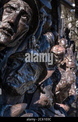 UK, London, Westminster. Bronze sculptures on the monument to the RAF (Battle of Britain Memorial) by British sculptor Paul Day, Stock Photo