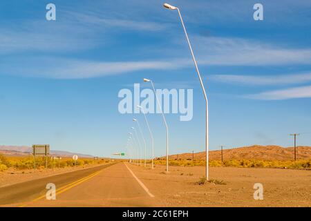 Empty highway at arid landscape environment, san juan province, argentina Stock Photo