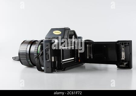 Canon T70 camera from 1984 with a 35-70mm lens from the back Stock Photo