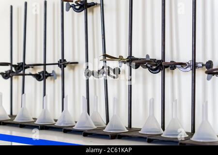Clamp holder. Laboratory equipment. Ring clamp are used to place separating  funnel and glass funnel. In a chemical laboratory Stock Photo - Alamy