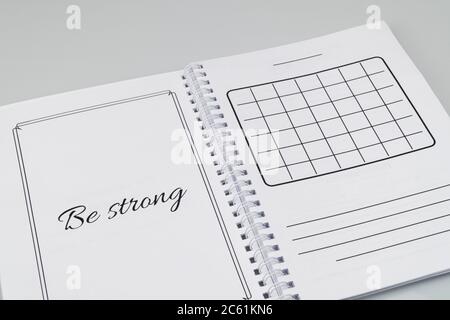 open notepad with markup on a white background Stock Photo