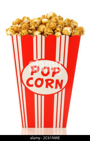 caramel popcorn in a decorative paper popcorn cup on a white background Stock Photo