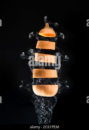 Butternut squash on a black background Stock Photo