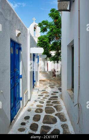 Greek Mykonos street on Mykonos island, Greece Stock Photo