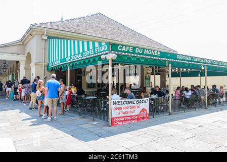 New Orleans, Louisiana/USA - 6/20/2020: Full side view of Cafe Du Monde in the French Quarter after reopening in phase 2 of the corona virus pandemic Stock Photo