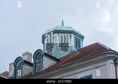 New Orleans, Louisiana/USA - 07/05/2020: Roof of the Napoleon House on Chartres Street featuring domed cupola and dormer windows Stock Photo