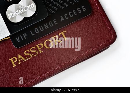 RUSSIA, MOSCOW - FEB 22, 2015: Premium credit card MasterCard Black Edition, Priority Pass card (card for VIP lounge access) and international passpor Stock Photo