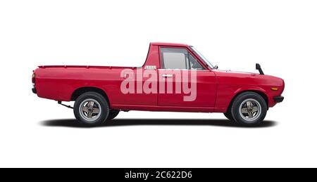 Classic Japanese red pick-up car side view isolated on white Stock Photo