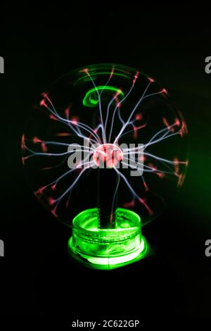 Plasma ball lit with stunning colors. Stock Photo