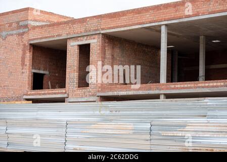 Construction of a brick building using columns Stock Photo