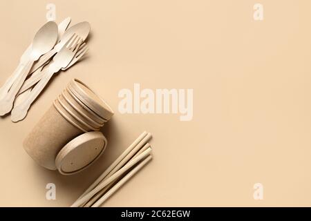Eco-friendly disposable cups and wooden spoons, forks, bamboo straws. Sustainable lifestyle. Zero waste. Stock Photo
