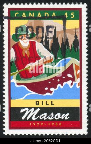 CANADA - CIRCA 1998: stamp printed by Canada, shows Bill Mason (1929-88), film maker canoe enthusiast, circa 1998 Stock Photo