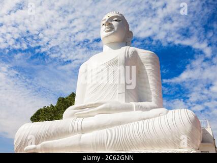 Bahirawa Kanda or Bahirawakanda Vihara Buddha Statue in Kandy, Sri Lanka. Bahirawakanda is a giant samadhi buddha statue on the top of the mountain in Stock Photo