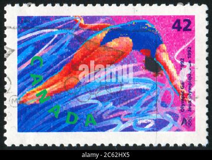 CANADA - CIRCA 1992: stamp printed by Canada, shows gymnast, circa 1992 Stock Photo