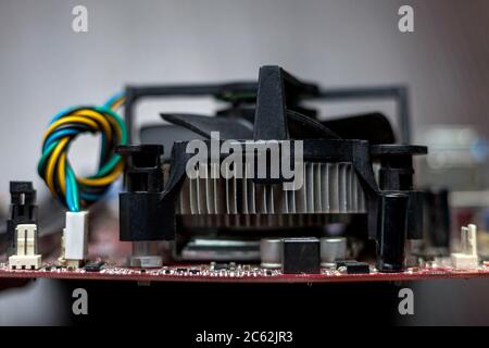 Side view of PCU cooler connected to the motherboard. Close-up view, background idea concept Stock Photo