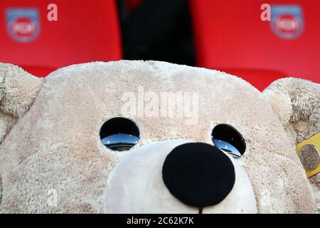 Heidenheim, Germany. 06th July, 2020. Football: Bundesliga, relegation, return match, 1st FC Heidenheim - Werder Bremen in the Voith-Arena. The stadium is reflected in the eyes of a teddy bear in the fan jersey of Heidenheim. IMPORTANT NOTE: According to the regulations of the DFL Deutsche Fußball Liga and the DFB Deutscher Fußball-Bund, it is prohibited to use or have used in the stadium and/or photographs taken of the game in the form of sequence pictures and/or video-like photo series. Credit: Tom Weller/dpa/Alamy Live News Stock Photo