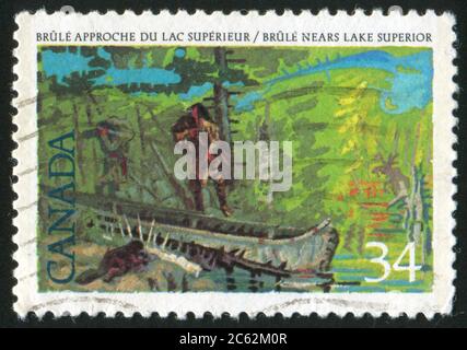 CANADA - CIRCA 1986: stamp printed by Canada, shows Pioneers of New France: Etienne Brule (c. 1592-1633), 1st European to see the Great Lakes, circa 1 Stock Photo