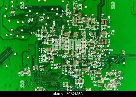 Circuit board. Electronic computer hardware technology. Motherboard digital chip. Printed Circuit Board with many electrical components. Stock Photo