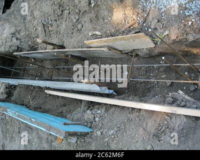 Foundation trench for the construction of the fence. Close-up from above. Stock Photo