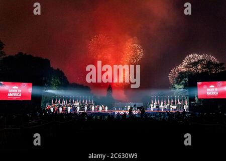 Fireworks explode over the National Mall during the annual Independence Day celebration on the South Lawn of the White House July 4, 2020 in Washington, DC. Stock Photo