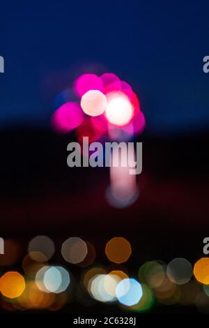 Bokeh; out-of-focus; Fourth of July fireworks over "S" Mountain; Salida; Colorado; USA Stock Photo