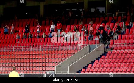 Heidenheim, Germany. 06th July, 2020. Football: Bundesliga, relegation, return match, 1st FC Heidenheim - Werder Bremen in the Voith-Arena. A group of spectators sits on the stands at short notice. (Best possible quality) IMPORTANT NOTICE: In accordance with the regulations of the DFL Deutsche Fußball Liga or the DFB Deutscher Fußball-Bund, it is prohibited to use or have used in the stadium and/or from the game taken photographs in the form of sequence pictures and/or video-like photo series. Credit: Tom Weller/dpa/Alamy Live News Stock Photo