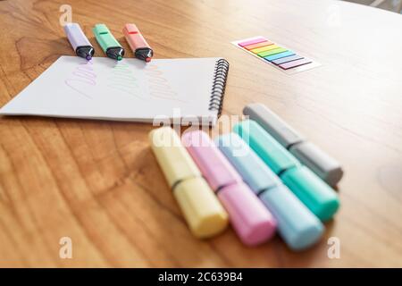 Drawing on a white sheet with a color highlighter Stock Photo
