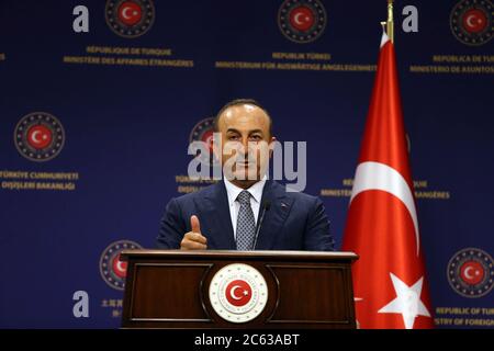 Ankara. 6th July, 2020. Turkish Foreign Minister Mevlut Cavusoglu speaks during a joint press conference with Josep Borrell (not in the picture), High Representative of the EU for Foreign Affairs and Security Policy, in Ankara, Turkey, on July 6, 2020. Turkey on Monday vowed to retaliate the European Union if the bloc decides to impose new sanctions on Turkey due to disagreement over the Eastern Mediterranean. Credit: Xinhua/Alamy Live News Stock Photo