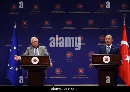 Ankara. 6th July, 2020. Turkish Foreign Minister Mevlut Cavusoglu (R) and Josep Borrell, High Representative of the EU for Foreign Affairs and Security Policy, attend a joint press conference in Ankara, Turkey, on July 6, 2020. Turkey on Monday vowed to retaliate the European Union if the bloc decides to impose new sanctions on Turkey due to disagreement over the Eastern Mediterranean. Credit: Xinhua/Alamy Live News Stock Photo
