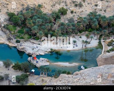 Natural swimming pools formed by flood waters in Wadi Bani Khalid, Sultanate of Oman. Stock Photo
