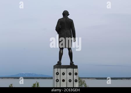 Captain James Cook statue in Resolution Park in Anchorage, Alaska overlooking Cook Inlet Stock Photo