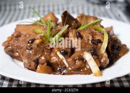 A popular dish in the Philippines known as Sweet & Sour Pork Adobo Stock Photo