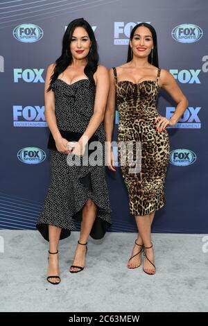 Brie Bella (L) and Nikki Bella attends the 2019 FOX Upfront at Wollman Rink, Central Park on May 13, 2019 in New York City. Stock Photo