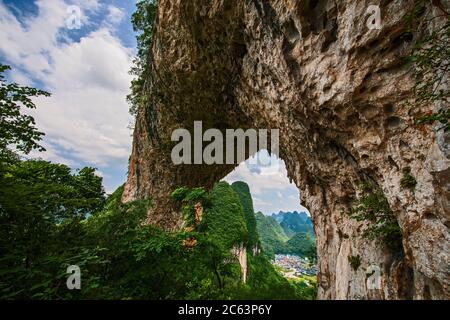 The iconic Moon Hill limestone arch close to Yangshuo Stock Photo