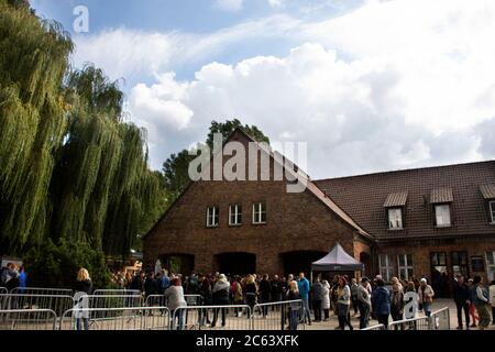 Polish or Pole people and foreign traveler group tour travel visit learn historic at Auschwitz Nazi concentration and extermination camp in Oswiecim o Stock Photo