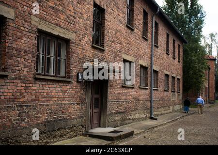 Polish or Pole people and foreign traveler group tour travel visit learn historic at Auschwitz Nazi concentration and extermination camp in Oswiecim o Stock Photo