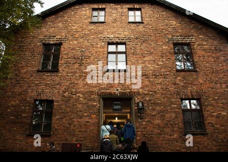 Polish or Pole people and foreign traveler group tour travel visit learn historic at Auschwitz Nazi concentration and extermination camp in Oswiecim o Stock Photo