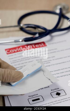 Laboratory scientist performs a rapid diagnostic test (rdt) for antibodies to detect the presence of viral proteins. caused by coronavirus disease COV Stock Photo