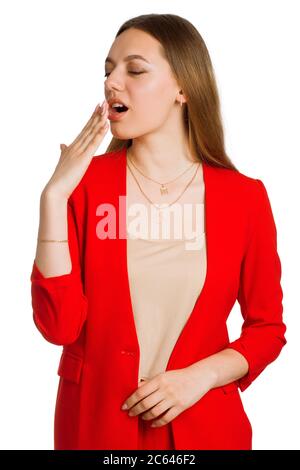 A young business office woman a background isolated in white, bored and yawning Stock Photo